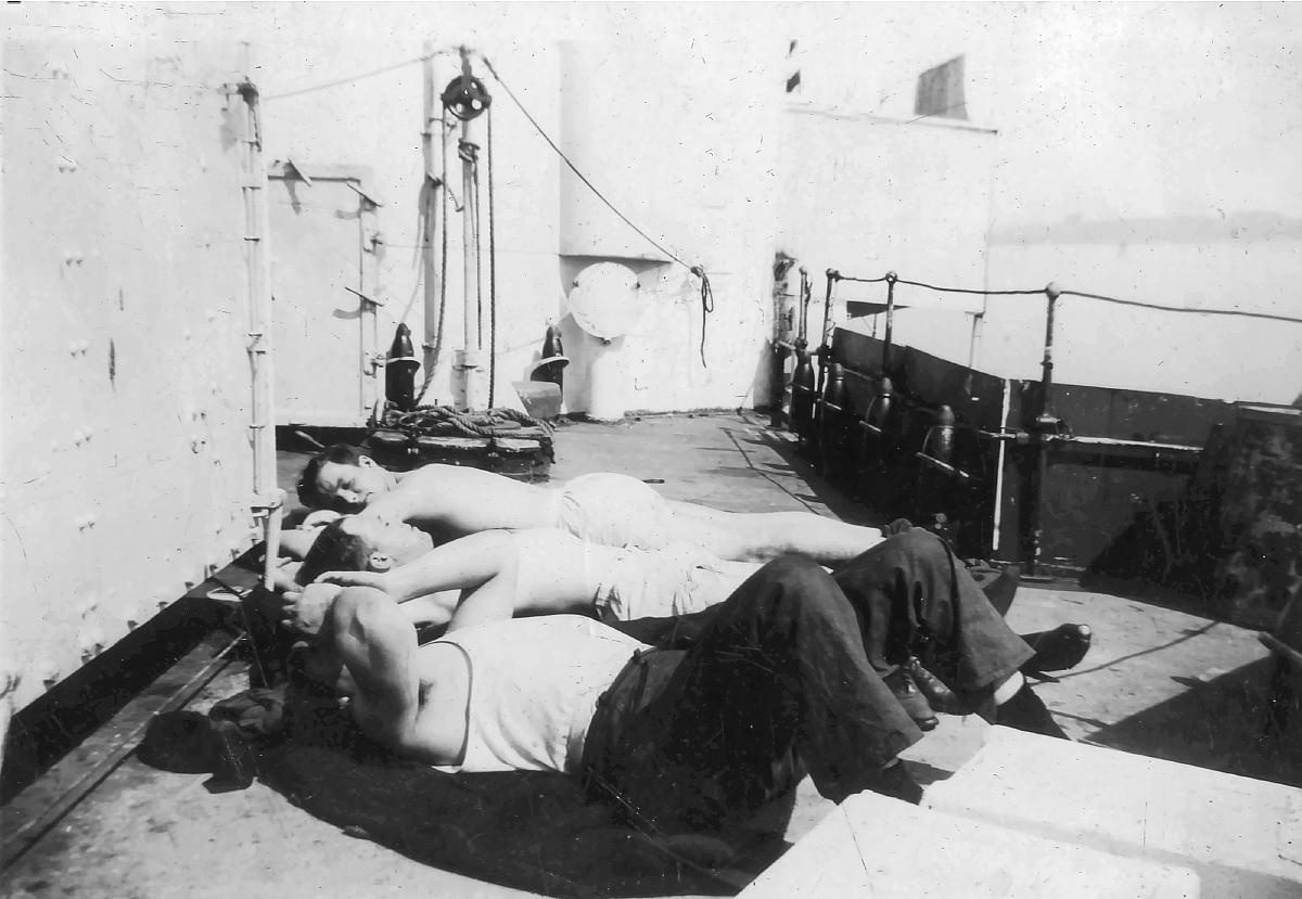 Crew working on their tans