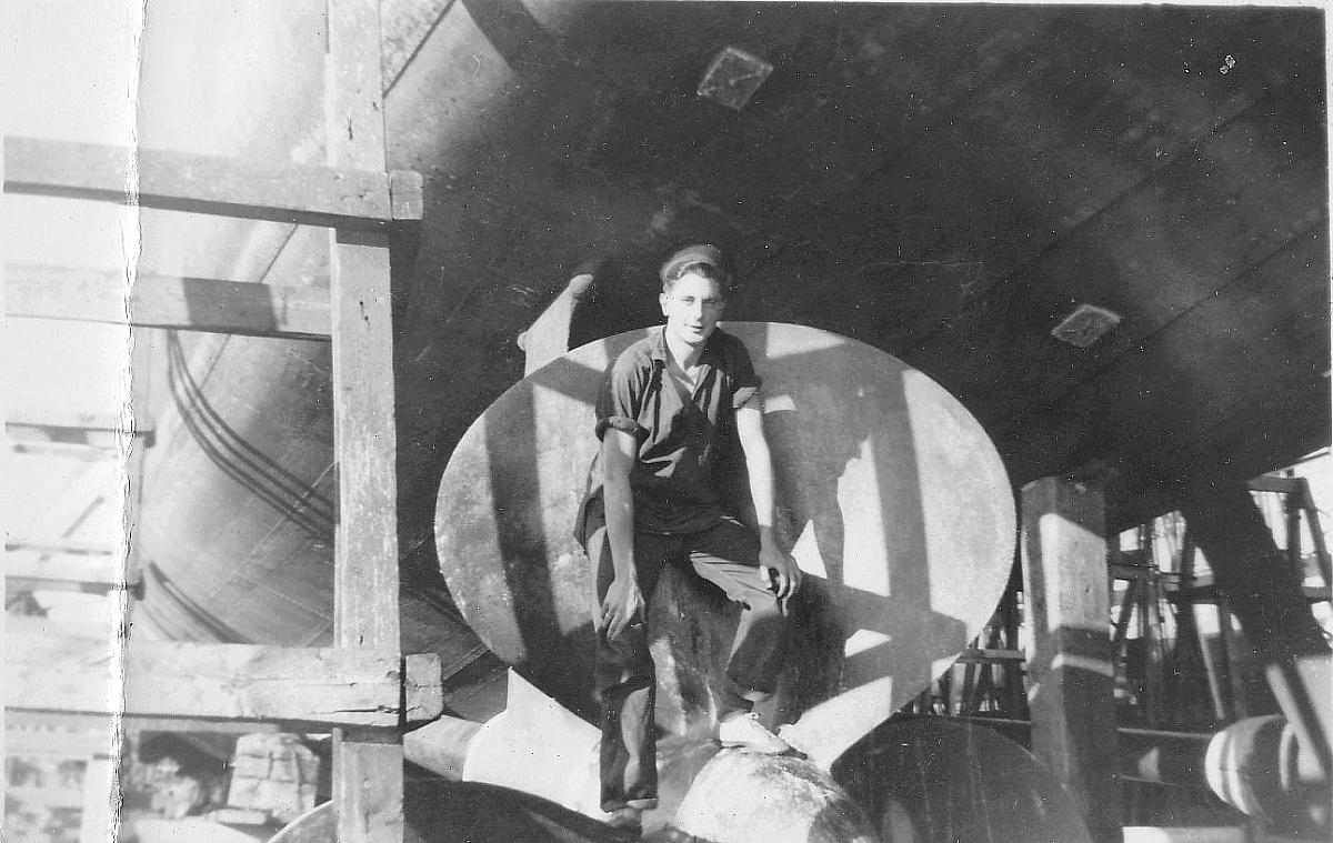 Tom Bilton on ship's propeller.